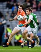 31 March 2018; Declan McCusker of Fermanagh gets past Andrew Murnin of Armagh during the Allianz Football League Division 3 Final match between Armagh and Fermanagh at Croke Park in Dublin. Photo by Piaras Ó Mídheach/Sportsfile