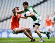31 March 2018; Micky Jones of Fermanagh in action against Ethan Rafferty of Armagh during the Allianz Football League Division 3 Final match between Armagh and Fermanagh at Croke Park in Dublin. Photo by David Fitzgerald/Sportsfile