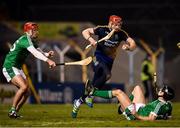 31 March 2018; Tipperary goalkeeper Daragh Mooney clears the final Limerick attack despite the pressure from Pat Ryan, right, and Barry Nash of Limerick during the Allianz Hurling League Division 1 semi-final match between Tipperary and Limerick at Semple Stadium in Thurles, Tipperary. Photo by Stephen McCarthy/Sportsfile