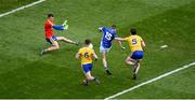 1 April 2018; Conor Bradley of Cavan scores his side's first goal past Roscommon goalkeeper James Featherson during the Allianz Football League Division 2 Final match between Cavan and Roscommon at Croke Park in Dublin. Photo by Daire Brennan/Sportsfile