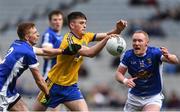 1 April 2018; Brian Stack of Roscommon in action against Jason McLoughlin, left, and Cian Mackey of Cavan during the Allianz Football League Division 2 Final match between Cavan and Roscommon at Croke Park in Dublin. Photo by Piaras Ó Mídheach/Sportsfile