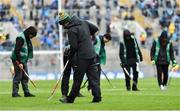 1 April 2018; Groundsman Colm Daly and his groundstaff tend to the pitch at half-time during the Allianz Football League Division 2 Final match between Cavan and Roscommon at Croke Park in Dublin. Photo by Piaras Ó Mídheach/Sportsfile