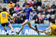 1 April 2018; Dara McVeety of Cavan scores a point despite the efforts of Niall Kilroy, left, and Fergal Lennon of Roscommon during the Allianz Football League Division 2 Final match between Cavan and Roscommon at Croke Park in Dublin. Photo by Piaras Ó Mídheach/Sportsfile