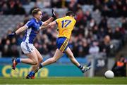 1 April 2018; Cathal Cregg of Roscommon shoots to score his side's third goal despite the attention of Padraig Faulkner of Cavan during the Allianz Football League Division 2 Final match between Cavan and Roscommon at Croke Park in Dublin. Photo by Stephen McCarthy/Sportsfile