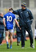 1 April 2018; Dara McVeety of Cavan is consoled by Roscommon selector Liam McHale after leaving the field with an injury during the Allianz Football League Division 2 Final match between Cavan and Roscommon at Croke Park in Dublin. Photo by Piaras Ó Mídheach/Sportsfile