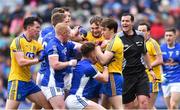 1 April 2018; Roscommon and Cavan players tussle as referee Seán Hurson looks on during the Allianz Football League Division 2 Final match between Cavan and Roscommon at Croke Park in Dublin. Photo by Piaras Ó Mídheach/Sportsfile