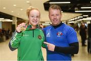 2 April 2018; Boxer Amy Broadhurst, who won a gold medal in the lightweight division at the European U22 Championships in Romania, with Dealgan boxing club coach Ian McKeown during the Team Ireland Boxing homecoming at Dublin Airport in Dublin. Photo by David Fitzgerald/Sportsfile