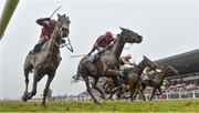 2 April 2018; General Principle, second from left, with JJ Slevin up, races alongside Isleofhopendreams, left, with Danny Mullins up, who finished second, on their way to winning the BoyleSports Irish Grand National Steeplechase on Day 2 of the Fairyhouse Easter Festival at Fairyhouse Racecourse in Meath. Photo by David Fitzgerald/Sportsfile