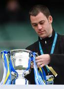 1 April 2018; Steward Colm Smith places the team ribbons on the cup before the Allianz Football League Division 2 Final match between Cavan and Roscommon at Croke Park in Dublin. Photo by Piaras Ó Mídheach/Sportsfile