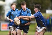 4 April 2018; Sean O'Connor of Metro is tackled by Shane O'Loughlin and Senan Brannock of North Midlands during the Shane Horgan Cup 5th Round match between North Midlands and Metro at Tullow RFC in Tullow, Co Carlow. Photo by Matt Browne/Sportsfile