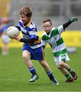 4 April 2018; Fionn Murphy of Templeogue Synge Street, Co Dublin, left, in action against Sam Grace of Round Towers Clondalkin, Co Dublin, during Day 2 of the The Go Games Provincial days in partnership with Littlewoods Ireland at Croke Park in Dublin. Photo by Piaras Ó Mídheach/Sportsfile