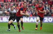 31 March 2018; Darren Sweetnam of Munster breaks clear of Chris Ashton of RC Toulon during the European Rugby Champions Cup quarter-final match between Munster and Toulon at Thomond Park in Limerick. Photo by Brendan Moran/Sportsfile