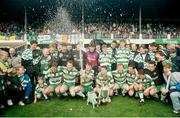 3 April 1994; Shamrock Rovers players, and Cindy the Dog, celebrate with the trophy after the Bord Gáis National League match between Shamrock Rovers and Cork City at the RDS in Dublin. Photo by Sportsfile