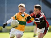 5 April 2018; Fintan McNamara of Cappagh GAA, Co. Limerick, in action against Bobby Gleeson of Moneygall GAA, Co. Tipperary, during Day 3 of the The Go Games Provincial days in partnership with Littlewoods Ireland at Croke Park in Dublin. Photo by Seb Daly/Sportsfile