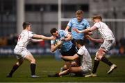 5 April 2018; Jamie Glynn of UCD is tackled by Trinity players, from left, Angus Lloyd, Kyle Dixon and Sam Pim during the Annual Rugby Colours Match 2018 match between UCD and Trinity at College Park in Trinity College, Dublin. Photo by Stephen McCarthy/Sportsfile