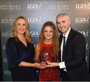 6 April 2018; Roisin Devlin of St Mary's Belfast, Co Antrim, receiving her Gourmet Food Parlour LGFA HEC Rising Star Award from Donal Barry, Chairperson Ladies HEC, and Lorraine Heskin, MD Gourmet Food Parlour, at the Croke Park Hotel on Friday, April 6th. The Gourmet Food Parlour LGFA HEC Rising Stars recognised the best performers in the fourth, fifth and sixth tier competitions. GFP O’Connor Cup weekend was recently hosted by IT Blanchardstown and the GAA’s National Games Development Centre in Abbotstown. The Croke Park Hotel in Dublin, Jones' Road, Dublin. Photo by David Fitzgerald/Sportsfile