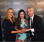 6 April 2018; Claire Canavan of St Mary's Belfast, Co Antrim, receiving her Gourmet Food Parlour LGFA HEC Rising Star Award from Donal Barry, Chairperson Ladies HEC, and Lorraine Heskin, MD Gourmet Food Parlour, at the Croke Park Hotel on Friday, April 6th. The Gourmet Food Parlour LGFA HEC Rising Stars recognised the best performers in the fourth, fifth and sixth tier competitions. GFP O’Connor Cup weekend was recently hosted by IT Blanchardstown and the GAA’s National Games Development Centre in Abbotstown. The Croke Park Hotel in Dublin, Jones' Road, Dublin. Photo by David Fitzgerald/Sportsfile