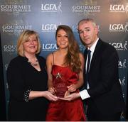6 April 2018; Sarah Rowe of Dublin City University, Co Dublin, receiving her Gourmet Food Parlour O’Connor Cup All Star Award from Marie Hickey, President of the LGFA, and Donal Barry, Chairperson Ladies HEC, at the Croke Park Hotel on Friday, April 6th. The Gourmet Food Parlour O’Connor Cup All Star team featured performers from the GFP O’Connor, Giles and Lynch Cup competitions. GFP O’Connor Cup weekend was recently hosted by IT Blanchardstown and the GAA’s National Games Development Centre in Abbotstown. The Croke Park Hotel in Dublin, Jones' Road, Dublin. Photo by David Fitzgerald/Sportsfile