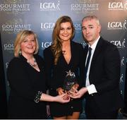 6 April 2018; Grace Kelly of University of Limerick, Co Limerick, receiving her Gourmet Food Parlour O’Connor Cup All Star Award from Marie Hickey, President of the LGFA, and Donal Barry, Chairperson Ladies HEC, at the Croke Park Hotel on Friday, April 6th. The Gourmet Food Parlour O’Connor Cup All Star team featured performers from the GFP O’Connor, Giles and Lynch Cup competitions. GFP O’Connor Cup weekend was recently hosted by IT Blanchardstown and the GAA’s National Games Development Centre in Abbotstown. The Croke Park Hotel in Dublin, Jones' Road, Dublin. Photo by David Fitzgerald/Sportsfile