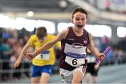 7 April 2018; James Flynn of Mullingar Harriers AC, Co. Westmeath, crosses the line to win the Under 12  Boys 4x100m relay team event, during the Irish Life Health National Juvenile Indoor Championships day 1 at Athlone IT in Athlone, Co Westmeath. Photo by Tomás Greally/Sportsfile