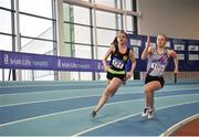 7 April 2018; Eabha Gilroy, left, Naas AC, Co. Kildare, passes Sarah Gaughran of Dundrum South Dublin AC, on her way to winning the Under 18 Girls 4x200m relay team event, during the Irish Life Health National Juvenile Indoor Championships day 1 at Athlone IT in Athlone, Co Westmeath. Photo by Tomás Greally/Sportsfile