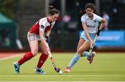 8 April 2018; Grace Irwin of Pegasus in action against Sarah Young of UCD during the Women's Irish Senior Cup Final match between UCD and Pegasus at the National Hockey Stadium in UCD, Dublin. Photo by David Fitzgerald/Sportsfile