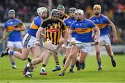 8 April 2018; Conor Fogarty of Kilkenny gets past Tipperary players, including Brendan Maher, left, and Ronan Maher, right, on his way to scoring his side's second goal during the Allianz Hurling League Division 1 Final match between Kilkenny and Tipperary at Nowlan Park in Kilkenny. Photo by Piaras Ó Mídheach/Sportsfile