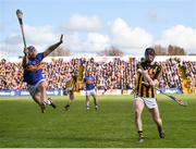 8 April 2018; Enda Morrissey of Kilkenny gets his shot away despite the attempted block of Jason Forde of Tipperary during the Allianz Hurling League Division 1 Final match between Kilkenny and Tipperary at Nowlan Park in Kilkenny. Photo by Stephen McCarthy/Sportsfile