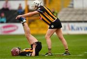 8 April 2018; Catherine Foley of Kilkenny helps team-mate Anne Dalton with cramp during the Littlewoods Ireland Camogie League Division 1 Final match between Kilkenny and Cork at Nowlan Park in Kilkenny. Photo by Piaras Ó Mídheach/Sportsfile