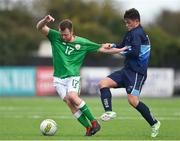 9 April 2018; Jonny Bonner of Ireland in action against Kieran Hall of Scotland during the Colleges & Universities Football League International Friendly match between Ireland and Scotland at Oriel Park, in Dundalk, Co. Louth. Photo by Seb Daly/Sportsfile