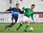 9 April 2018; Shane Elworthy of Ireland in action against Robbie McGale of Scotland during the Colleges & Universities Football League International Friendly match between Ireland and Scotland at Oriel Park, in Dundalk, Co. Louth. Photo by Seb Daly/Sportsfile