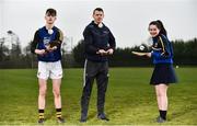 11 April 2018; GAA star TJ Reid was at Castlecomer Community School in Kilkenny today to launch the GAA Super Games Centre in partnership with Sky Sports at the school. The Super Games Centres which are based all over the country, were set up to reduce youth drop out and encourage “play to stay” amongst youth, specifically between the ages of 12 and 17 where youth drop out is most prevalent. Sky Sports is supporting the GAA Super Games Centres by arranging visits with Sky Sports mentors and providing kits and equipment to the estimated 9000 members countrywide. Pictured is TJ Reid with Castlecomer Community School pupils Tommy Coogan, aged 14, and Caoimhe Hennessy, aged 14, during the launch. Photo by Sam Barnes/Sportsfile