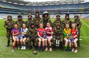 11 April 2018; The Lidl All Ireland Post Primary Schools Finals were launched today at Croke Park. The finals will be contested at Senior and Junior levels, with three finals in each grade. It’s an all-Loreto decider in the Senior A final, with Loreto (Clonmel, Tipperary) meeting Loreto (Cavan). Meanwhile, Glenamaddy (Galway) will play Presentation, Thurles (Tipperary) in the senior B final and in the senior C decider, Coláiste Bhaile Chláir, Claregalway (Galway) will take on Scoil Mhuire, Trim (Meath). Loreto (Cavan) are also in the junior A decider, where their opponents are ISK, Killorglin (Kerry). In the junior B final, Coláiste Bhaile Chláir, Claregalway (Galway) are also involved, and their opponents are St Brigid’s S.S., Killarney, Kerry. Finally, the junior C final is the meeting of St Marys H.S., Midleton (Cork) and St Clare's Comprehensive, Manorhamilton (Leitrim). Full fixture details available at www.ladiesgaelic.ie. Pictured are members of the Engineer Specialist Search and Clearance Team, Corps of Engineers, Irish Defence Forces, with team captains, from left, Junior B Finalists Chellene Trill, Coláiste Bháile Chláir, Claregalway, Galway, left, and Anna Clifford, St Brigid's, Killarney, Kerry, Junior A Finalists Cora Joy, ISK, Killorgin, Kerry, left, and Elaine Brady, Loreto, Cavan, and Junior C Finalists Laura Fowley, St Clare's, Leitrim, left, and Aine O'Driscoll, St Mary's, Cork. Croke Park, Dublin. Photo by Piaras Ó Mídheach/Sportsfile