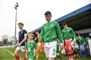 12 April 2018; Republic of Ireland captain Cian Murphy leads his team out prior to the U18s Schools match between Republic of Ireland and Scotland at Home Farm FC in Whitehall, Dublin. Photo by David Fitzgerald/Sportsfile