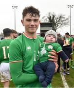 12 April 2018; Darryl Walsh of Republic of Ireland with his cousin Freddy, age 4 months, following the U18s Schools match between Republic of Ireland and Scotland at Home Farm FC in Whitehall, Dublin. Photo by David Fitzgerald/Sportsfile