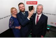 12 April 2018; Sportsfile staff photographer Stephen McCarthy from Cahersiveen, County Kerry, who was awarded second place in the Sports category by the World Press Photo Foundation, with his parents Leo and Maura McCarthy. Stephen's photograph entitled 'Steaming Scrum' features The British and Irish Lions and Maori All Blacks engaging in a scrum during a match at Rotorua International Stadium, on June 17, 2017, in Rotorua, New Zealand. Photo by Diarmuid Greene/Sportsfile