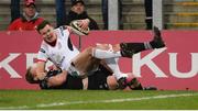 13 April 2018; Jacob Stockdale of Ulster is tackled short of the line by Jeff Hassler of Ospreys during the Guinness PRO14 Round 20 match between Ulster and Ospreys at Kingspan Stadium in Belfast. Photo by Oliver McVeigh/Sportsfile