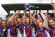 14 April 2018; Coláiste Bhaile Chláir, Claregalway, captain Gemma Coll lifts the cup as her team-mates celebrate after the Lidl All Ireland Post Primary School Senior C Final match between Coláiste Bhaile Chláir, Claregalway, Galway and Scoil Mhuire, Trim, Meath at Kinnegad in County Westmeath. Photo by Matt Browne/Sportsfile