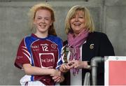 14 April 2018; Marie Hickey, Ladies Gaelic Football Association President presents the player of the match trophy to Kate Slevin of Coláiste Bhaile Chláir, Claregalway after the Lidl All Ireland Post Primary School Senior C Final match between Coláiste Bhaile Chláir, Claregalway, Galway and Scoil Mhuire, Trim, Meath at Kinnegad in County Westmeath. Photo by Matt Browne/Sportsfile