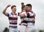 15 April 2018; Tino Mafoe of Tullow celebrates with team-mates Shane Rohan, centre, and Gareth Fitzgerald after scoring his side's first try during the Bank of Ireland Provincial Towns Cup Semi-Final match between Tullow RFC and Wicklow RFC at Cill Dara RFC in Kildare. Photo by Eóin Noonan/Sportsfile