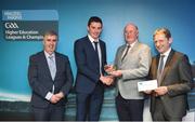 16 April 2018; UL hurler Gearóid Hegarty from Limerick is presented with his award by Uachtarán Chumann Lúthchleas Gael John Horan, in the company of  Jim Dollard, Executive Director Electric Ireland, right, and Gerry Tully, Chairman of Comhairle Ardoideachais CLG, left, at the Electric Ireland HE GAA Football & Hurling Rising Stars Awards for 2018, in Croke Park. The awards acknowledge outstanding performances in the battle for third level football and hurling Championships and come at the end of what was an epic season of GAA action. Photo by Stephen McCarthy/Sportsfile