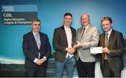 16 April 2018; UCD footballer Evan O’Carroll from Laois is presented with his award by Uachtarán Chumann Lúthchleas Gael John Horan, in the company of Jim Dollard, Executive Director of Electric Ireland, right, and Gerry Tully, Chairman of Comhairle Ardoideachais CLG, left, at the Electric Ireland HE GAA Football & Hurling Rising Stars Awards for 2018, in Croke Park. The awards acknowledge outstanding performances in the battle for third level football and hurling Championships and come at the end of what was an epic season of GAA action. Photo by Stephen McCarthy/Sportsfile