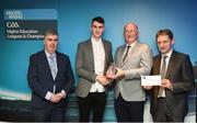 16 April 2018; NUIG footballer Enda Tierney from Galway is presented with his award by Uachtarán Chumann Lúthchleas Gael John Horan, in the company of Jim Dollard, Executive Director of Electric Ireland, right, and Gerry Tully, Chairman of Comhairle Ardoideachais CLG, left, at the Electric Ireland HE GAA Football & Hurling Rising Stars Awards for 2018, in Croke Park. The awards acknowledge outstanding performances in the battle for third level football and hurling Championships and come at the end of what was an epic season of GAA action. Photo by Stephen McCarthy/Sportsfile
