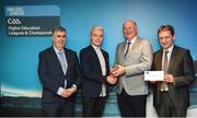 16 April 2018; UCD footballer Conor McCarthy from Monaghan is presented with his award by Uachtarán Chumann Lúthchleas Gael John Horan, in the company of Jim Dollard, Executive Director of Electric Ireland, right, and Gerry Tully, Chairman of Comhairle Ardoideachais CLG, left, at the Electric Ireland HE GAA Football & Hurling Rising Stars Awards for 2018, in Croke Park. The awards acknowledge outstanding performances in the battle for third level football and hurling Championships and come at the end of what was an epic season of GAA action. Photo by Stephen McCarthy/Sportsfile
