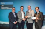 16 April 2018; Ulster University footballer Michael McKernan from Tyrone is presented with his award by Uachtarán Chumann Lúthchleas Gael John Horan, in the company of  Jim Dollard, Executive Director of Electric Ireland, right, and Gerry Tully, Chairman of Comhairle Ardoideachais CLG, left, at the Electric Ireland HE GAA Football & Hurling Rising Stars Awards for 2018, in Croke Park. The awards acknowledge outstanding performances in the battle for third level football and hurling Championships and come at the end of what was an epic season of GAA action. Photo by Stephen McCarthy/Sportsfile