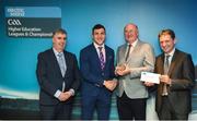 16 April 2018; NUIG footballer Damien Comer from Galway is presented with his award by Uachtarán Chumann Lúthchleas Gael John Horan, in the company of Jim Dollard, Executive Director of Electric Ireland, right, and Gerry Tully, Chairman of Comhairle Ardoideachais CLG, left, at the Electric Ireland HE GAA Football & Hurling Rising Stars Awards for 2018, in Croke Park. The awards acknowledge outstanding performances in the battle for third level football and hurling Championships and come at the end of what was an epic season of GAA action. Photo by Stephen McCarthy/Sportsfile