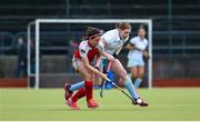 8 April 2018; Katie Mullan of UCD in action against Michelle Harvey of Pegasus during the Women's Irish Senior Cup Final match between UCD and Pegasus at the National Hockey Stadium in UCD, Dublin. Photo by David Fitzgerald/Sportsfile