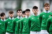 12 April 2018; Ireland players stand for the national anthem prior to the U18s Schools match between Republic of Ireland and Scotland at Home Farm FC in Whitehall, Dublin. Photo by David Fitzgerald/Sportsfile
