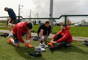 17 April 2018; Alex Wootton, Rory Scannell, and Sammy Arnold in conversation as they tie their boot laces prior to Munster Rugby squad training at the University of Limerick in Limerick. Photo by Diarmuid Greene/Sportsfile
