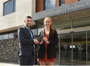 18 April 2018; Ian Monks, Senior Manager at The Croke Park Hotel, presents Aishling Moloney of Dublin City University and Tipperary with The Croke Park Hotel and LGFA Player of the Month award for March, at The Croke Park Hotel in Jones Road, Dublin. Aishling captained Dublin City University to victory in the prestigious Gourmet Food Parlour Ladies HEC O’Connor Cup competition, while Tipperary have also progressed to the Division 2 semi-finals in the Lidl Ladies National Football League. Photo by Matt Browne/Sportsfile